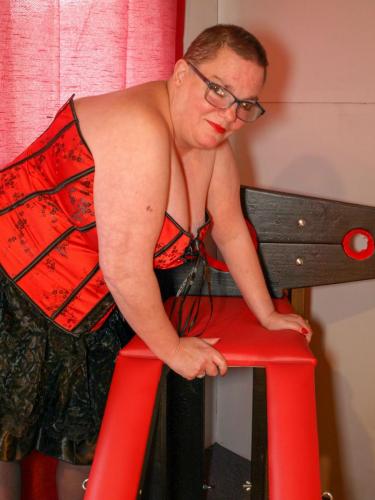 Corsets and spanking benches go well together.